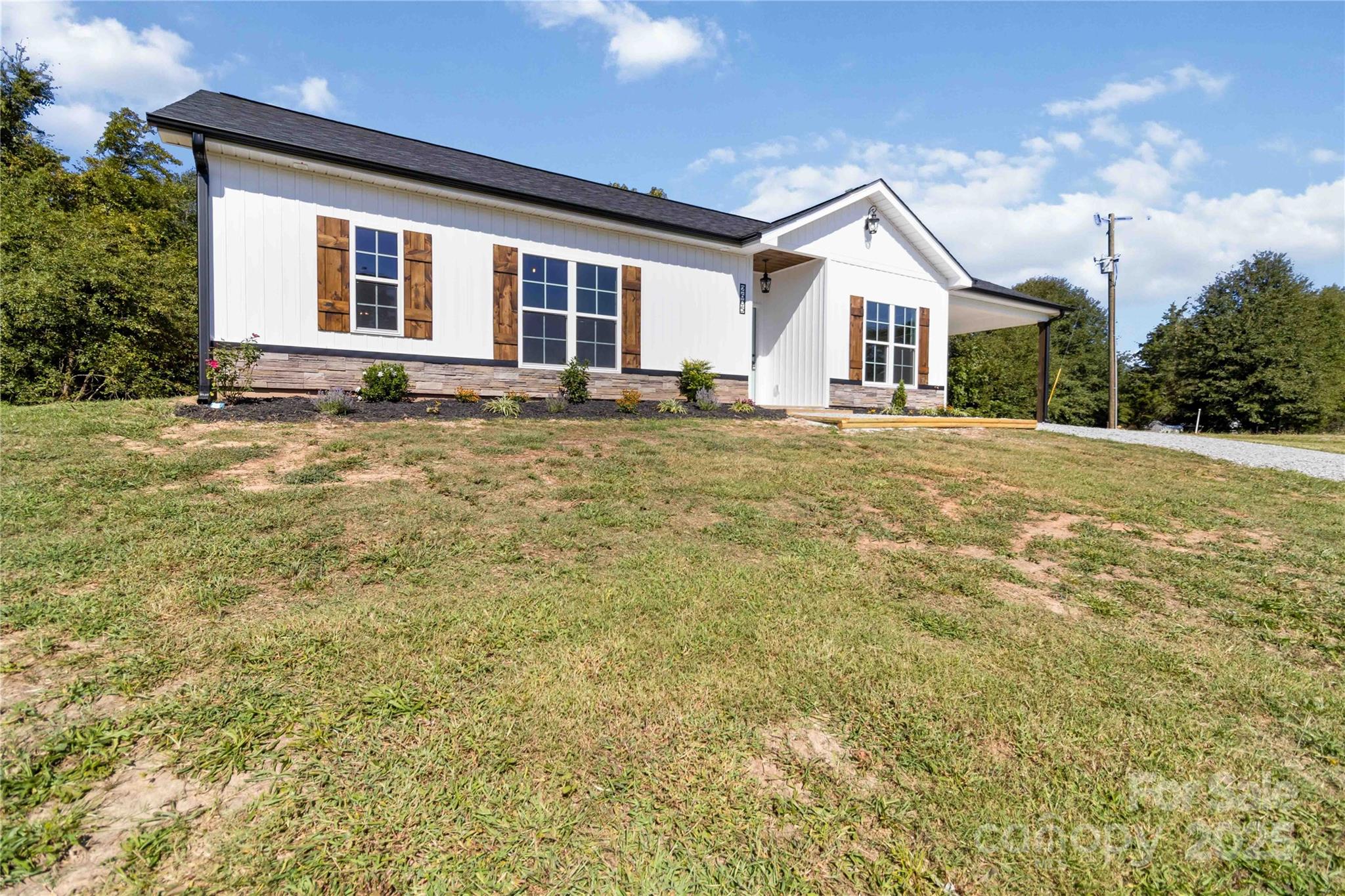 2605 Mt Prospect Road Chester, SC 29706 - Photo 5 of 31 a front view of a house with a yard