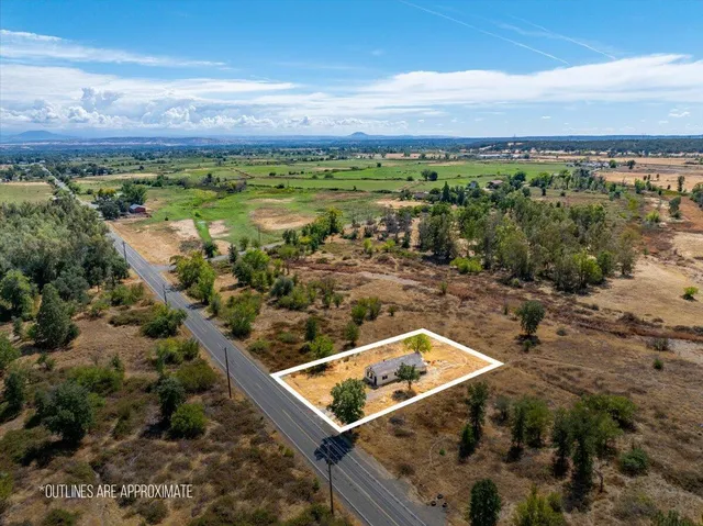 a view of a city with an ocean