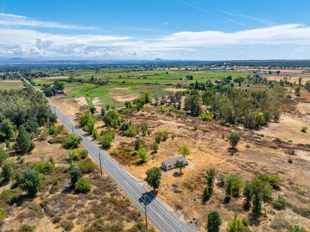 a view of a city with an ocean view