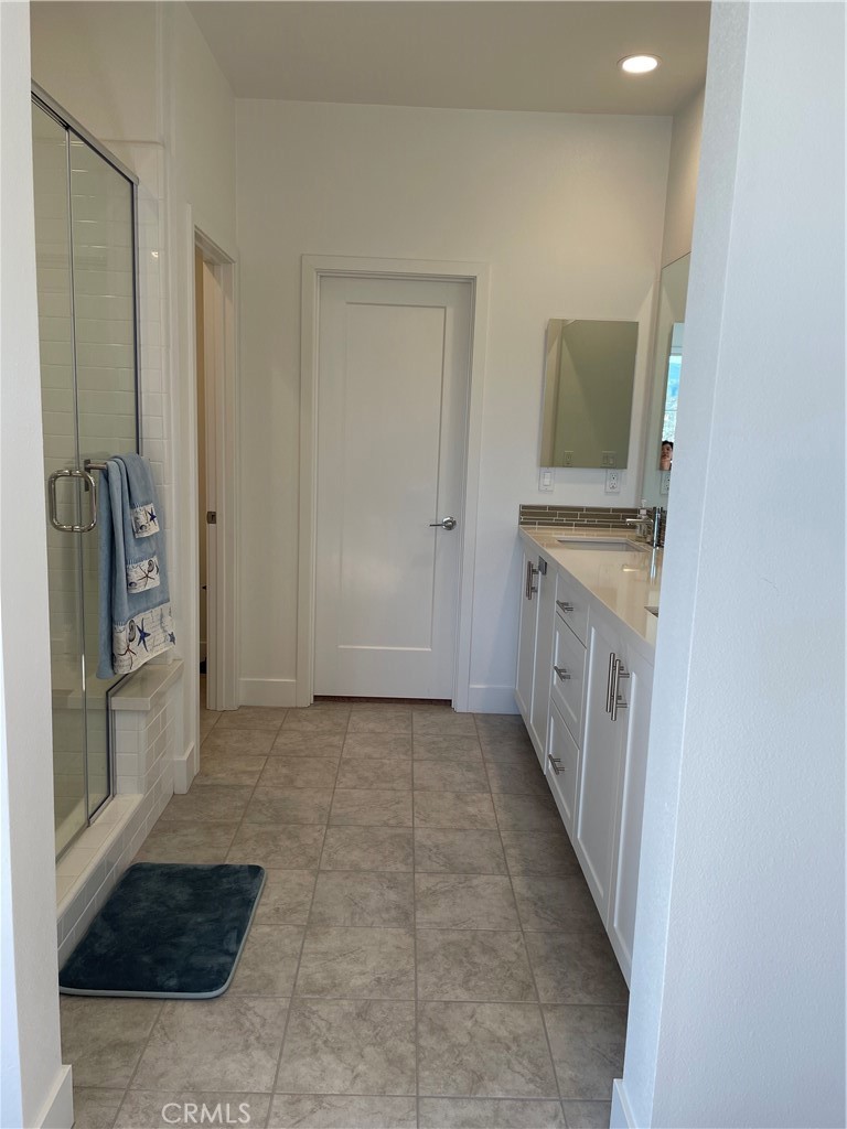 203 Novel Irvine, CA 92618 - Photo 13 of 24 a view of a hallway to rooms and stairs