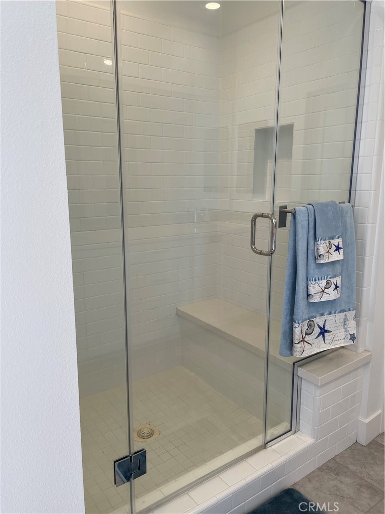 203 Novel Irvine, CA 92618 - Photo 14 of 24 a bathroom with a shower
