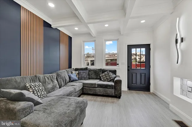 a living room with furniture and a couch