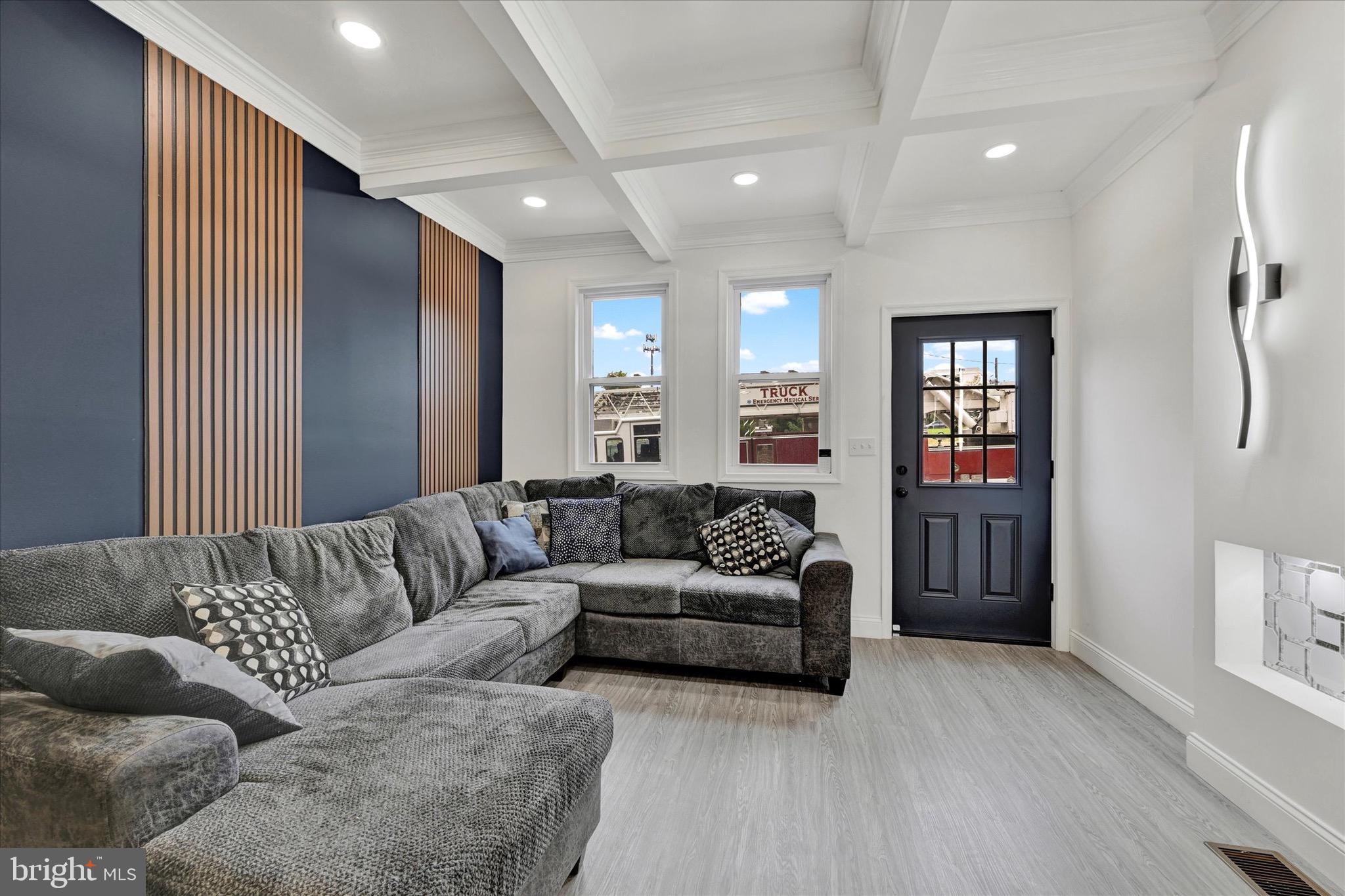 1748 North Chester Street Baltimore, MD 21213 - Photo 3 of 27 a living room with furniture and a couch