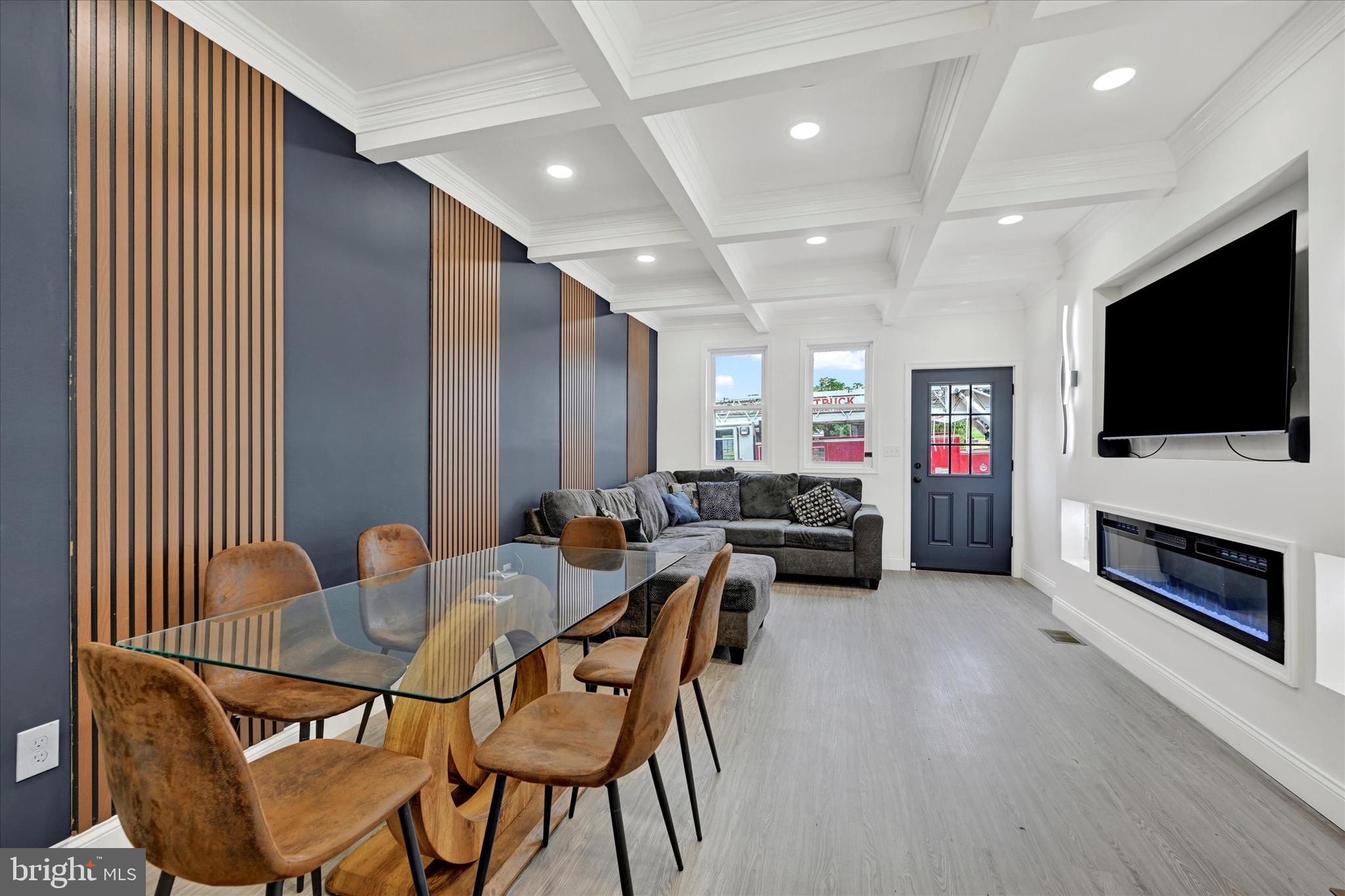 1748 North Chester Street Baltimore, MD 21213 - Photo 7 of 27 a living room with furniture and a flat screen tv