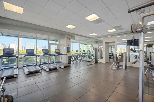 a room with lots of table and chairs