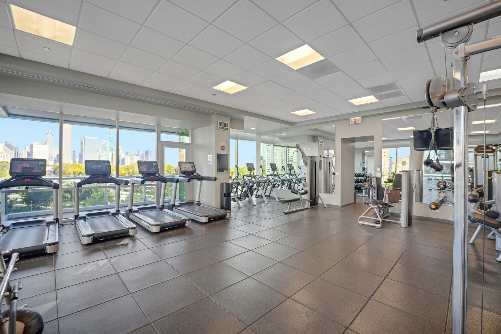 1201 South Prairie Avenue, Unit 2404 Chicago, IL 60605 - Photo 16 of 25 a room with lots of table and chairs