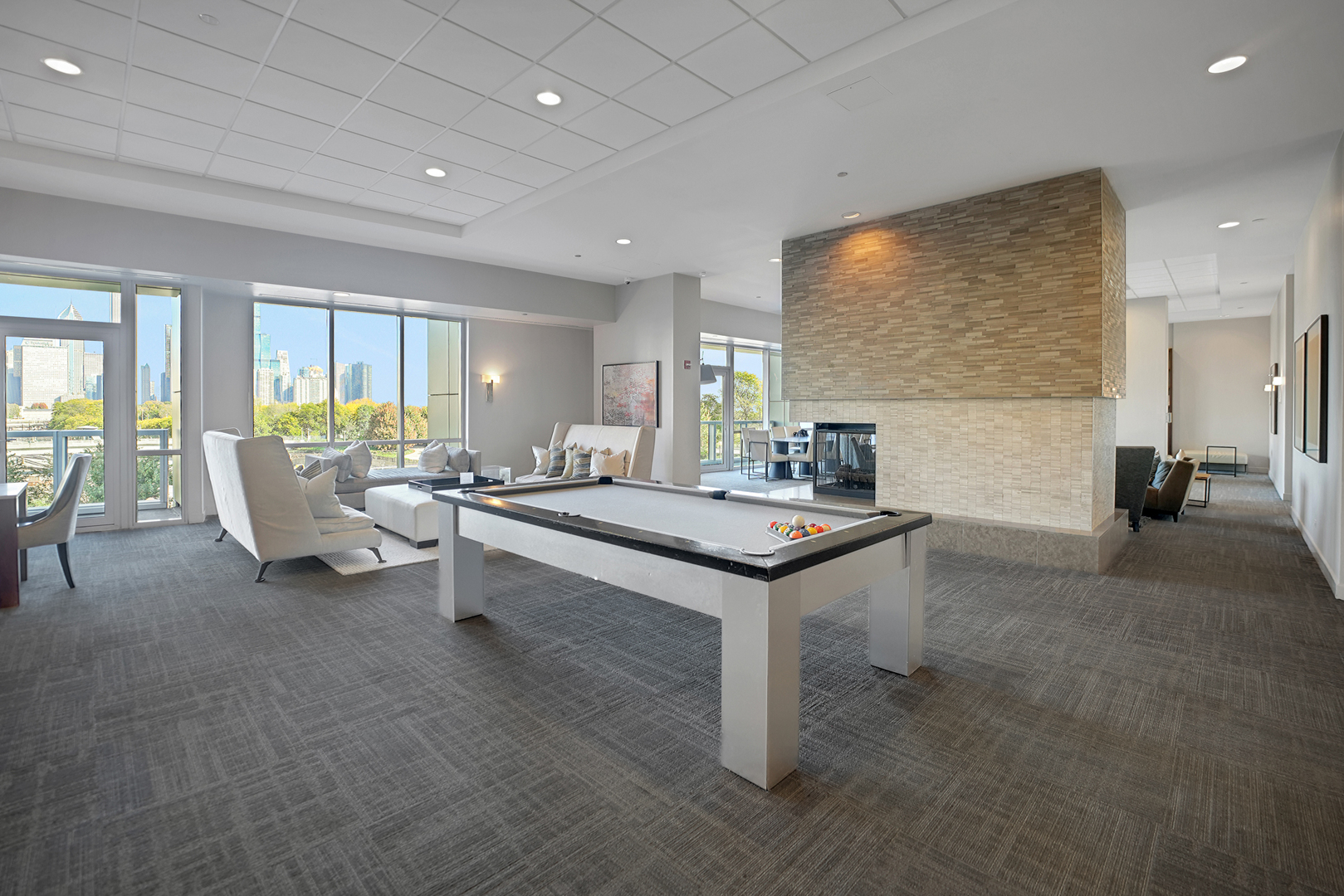 1201 South Prairie Avenue, Unit 2404 Chicago, IL 60605 - Photo 19 of 25 a living room with a table chairs and a table