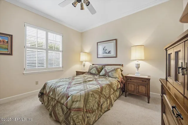 a bathroom with a sink toilet vanity and shower