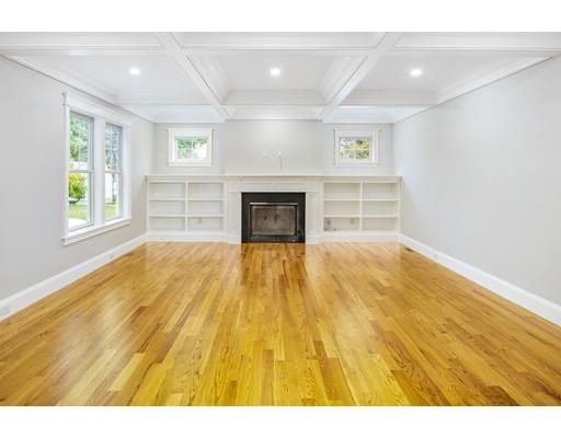 24 Wilson Road Lexington, MA 02421 - Photo 11 of 29 a view of empty room with wooden floor and fireplace