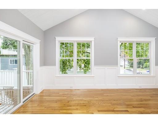 24 Wilson Road Lexington, MA 02421 - Photo 12 of 29 a view of an empty room with wooden floor and a window