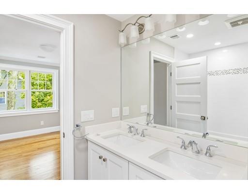 24 Wilson Road Lexington, MA 02421 - Photo 21 of 29 a bathroom with a sink mirror and a bathtub