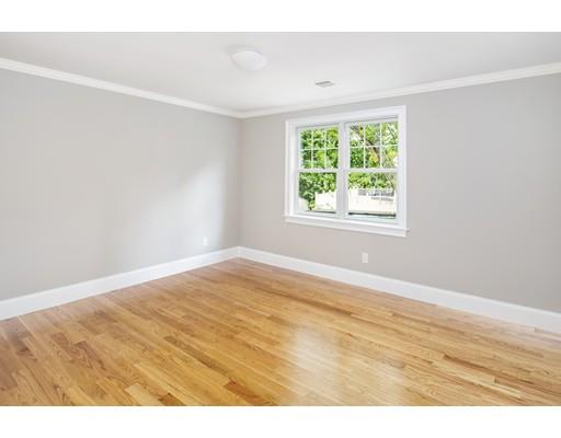 24 Wilson Road Lexington, MA 02421 - Photo 22 of 29 a view of an empty room with wooden floor and a window