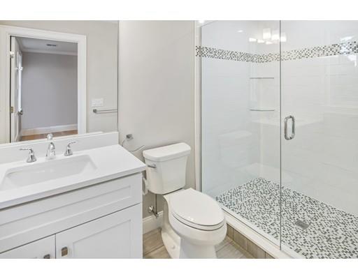24 Wilson Road Lexington, MA 02421 - Photo 24 of 29 a bathroom with a sink a toilet and shower