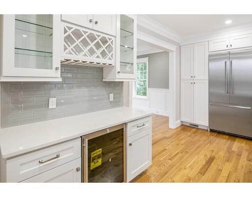 24 Wilson Road Lexington, MA 02421 - Photo 8 of 29 a kitchen with a wooden floor and window