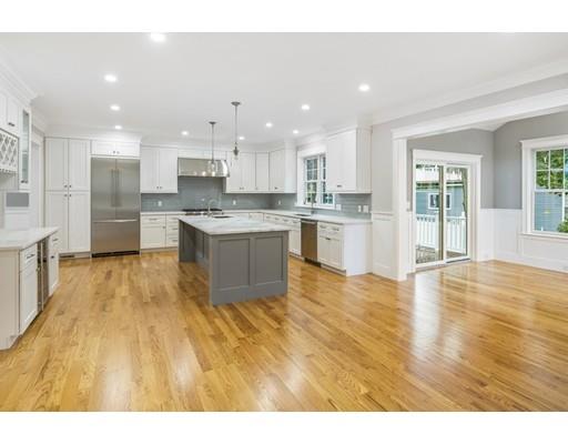 24 Wilson Road Lexington, MA 02421 - Photo 10 of 29 a large kitchen with granite countertop a large counter top and stainless steel appliances