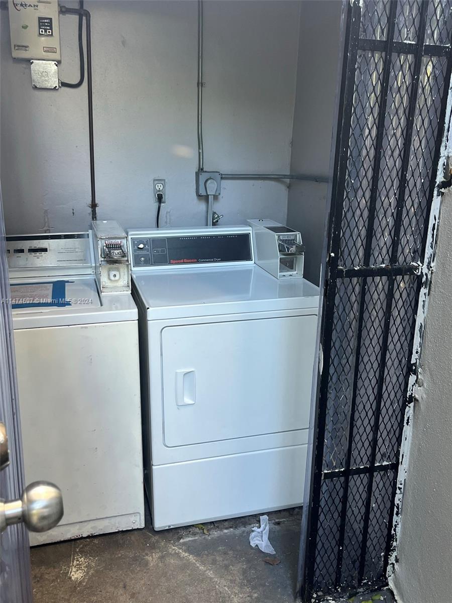 180 Northeast 71st Street, Unit 2 Miami, FL 33138 - Photo 9 of 10 a utility room with dryer and washer