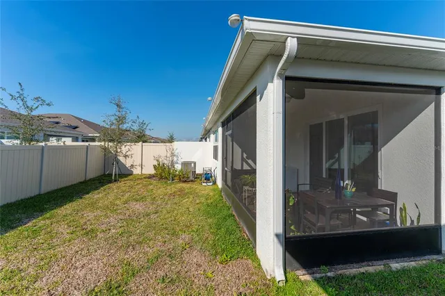 a view of a back yard of the house