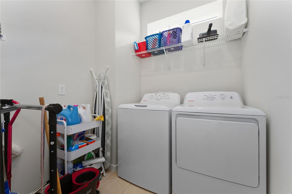 1880 Spring Shower Circle Kissimmee, FL 34744 - Photo 30 of 43 a utility room with dryer and washer