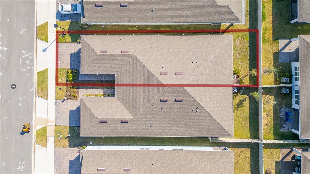 1880 Spring Shower Circle Kissimmee, FL 34744 - Photo 32 of 43 an aerial view of a house with a yard