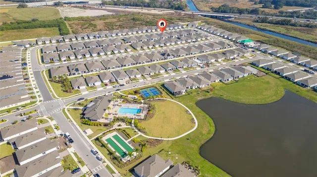 view of a swimming pool with a patio