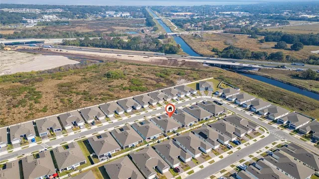 a view of a city with a lake