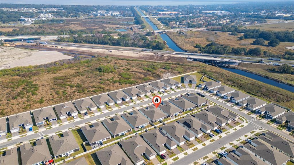 1880 Spring Shower Circle Kissimmee, FL 34744 - Photo 38 of 43 a view of a city with a lake