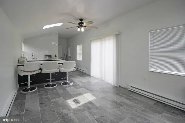 a view of a workspace with furniture