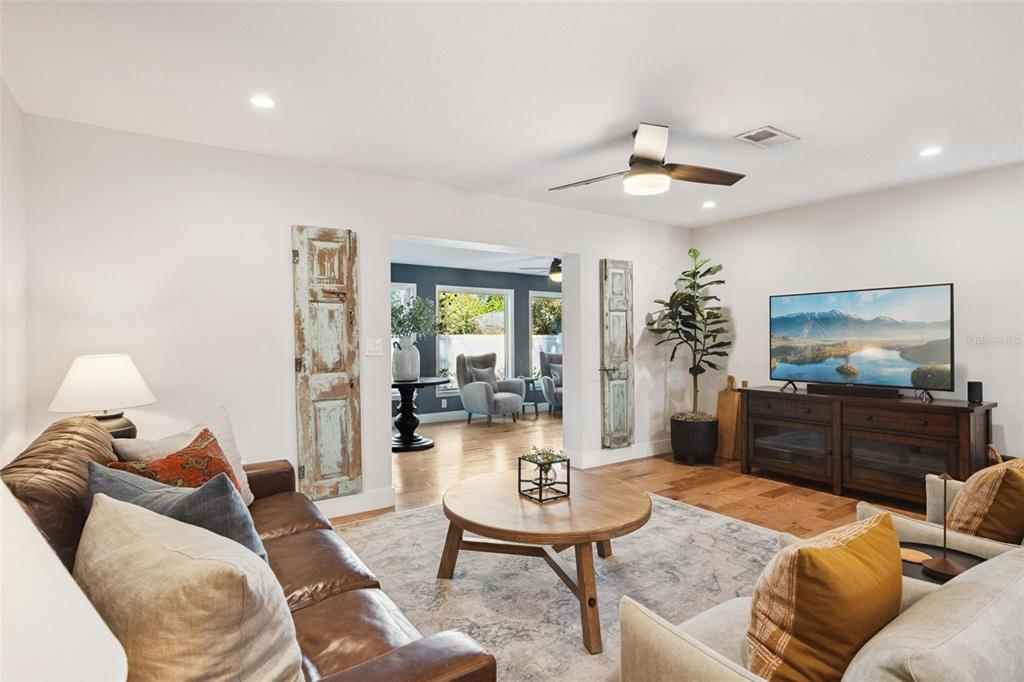 2609 Summerfield Road Winter Park, FL 32792 - Photo 11 of 40 a living room with furniture and a flat screen tv