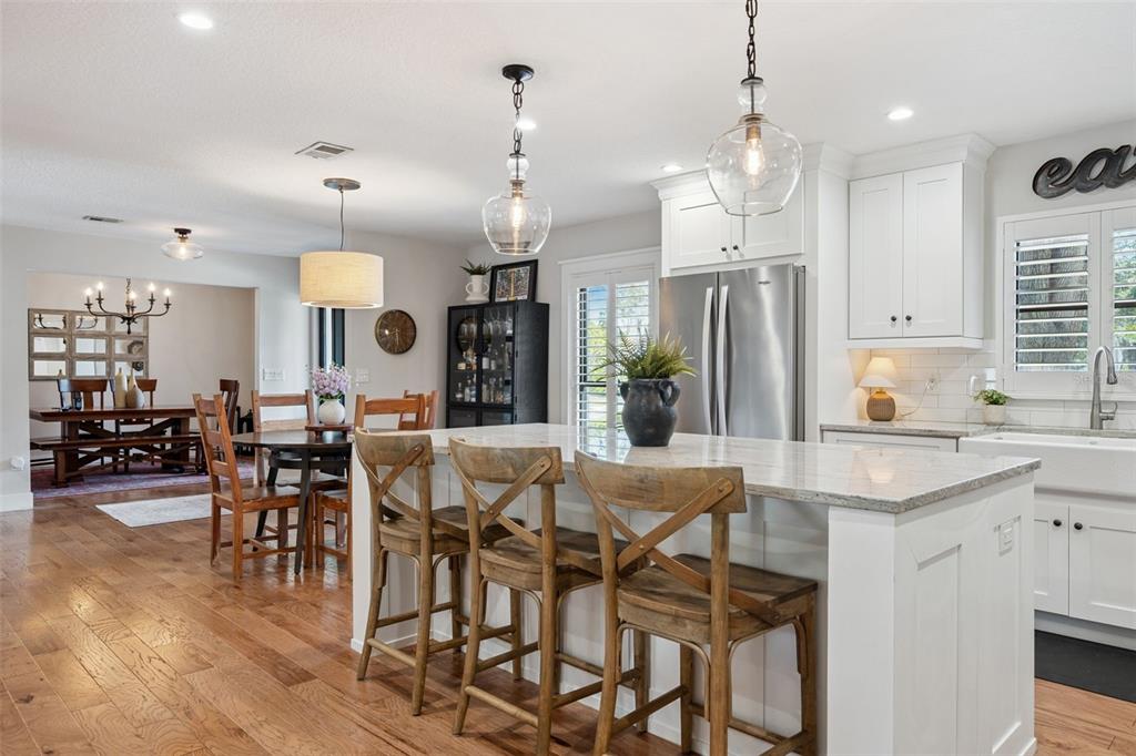 2609 Summerfield Road Winter Park, FL 32792 - Photo 16 of 40 a large kitchen with a table and chairs