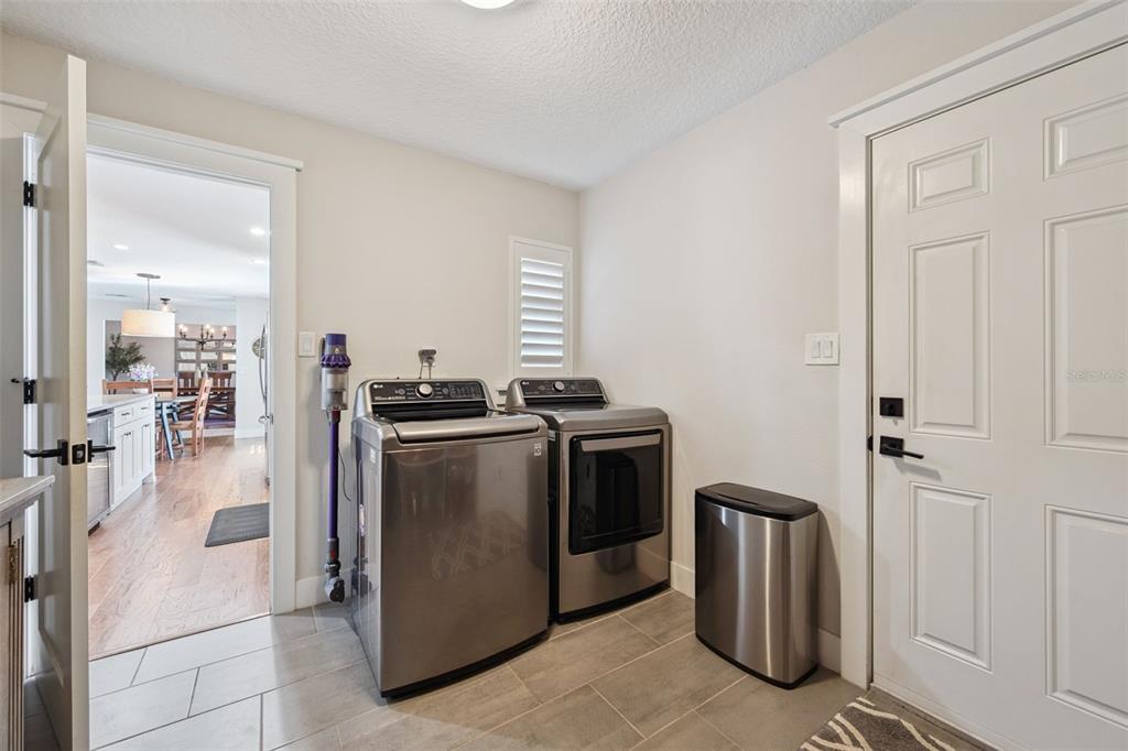 2609 Summerfield Road Winter Park, FL 32792 - Photo 17 of 40 a kitchen with stainless steel appliances granite countertop a refrigerator and a sink