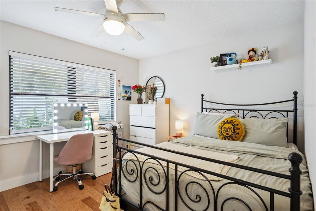 2609 Summerfield Road Winter Park, FL 32792 - Photo 27 of 40 a bedroom with a bed and a desk