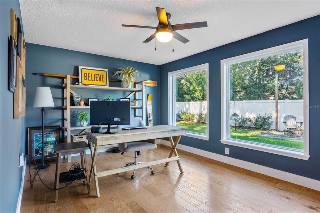 2609 Summerfield Road Winter Park, FL 32792 - Photo 34 of 40 a work room with furniture and a flat screen tv