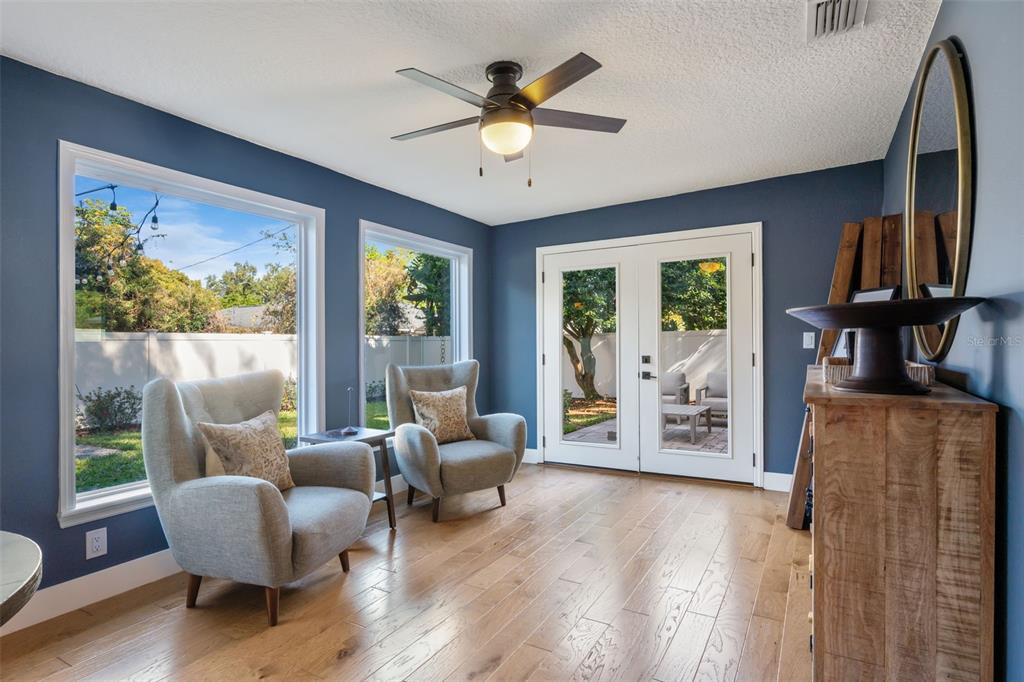 2609 Summerfield Road Winter Park, FL 32792 - Photo 35 of 40 a living room with furniture and a large window