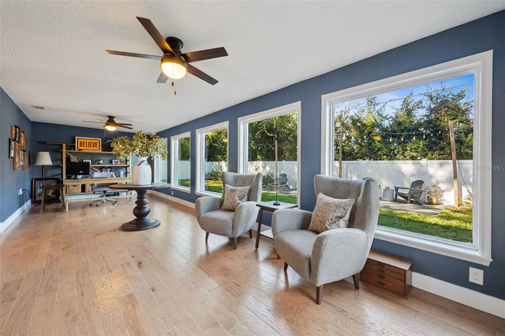 2609 Summerfield Road Winter Park, FL 32792 - Photo 36 of 40 a living room with furniture and a large window