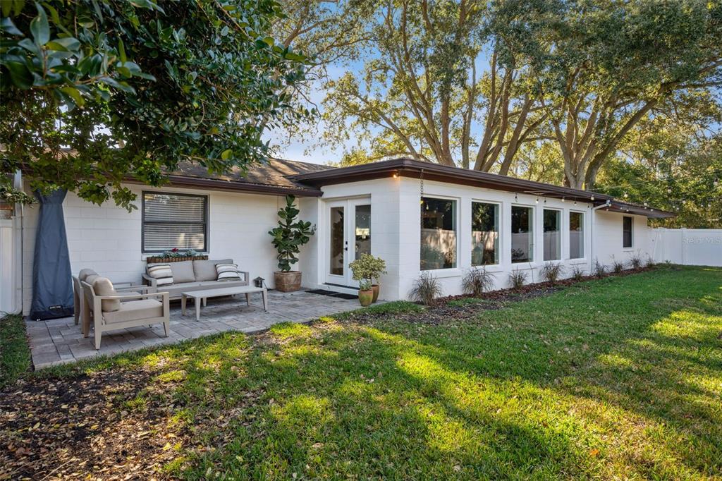 2609 Summerfield Road Winter Park, FL 32792 - Photo 37 of 40 a view of a house with a backyard and sitting area