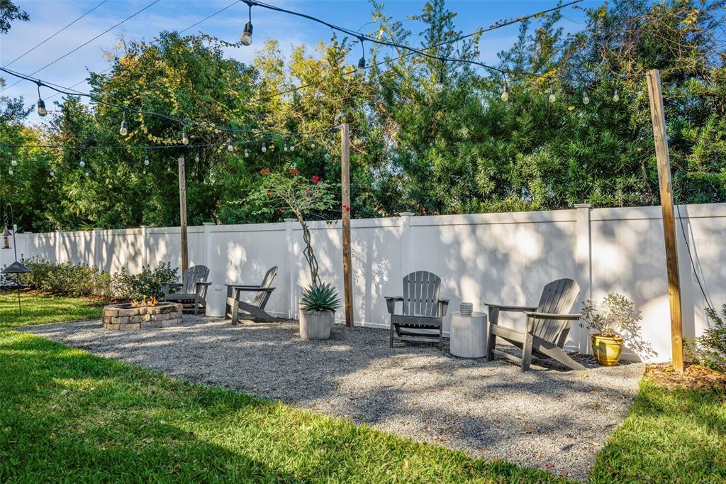 2609 Summerfield Road Winter Park, FL 32792 - Photo 40 of 40 a backyard of a house with table and chairs