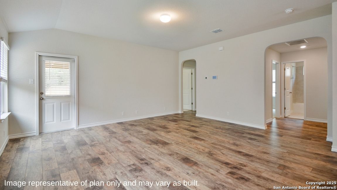 154 Double L Drive Comfort, TX 78620 - Photo 11 of 26 a view of an empty room and wooden floor