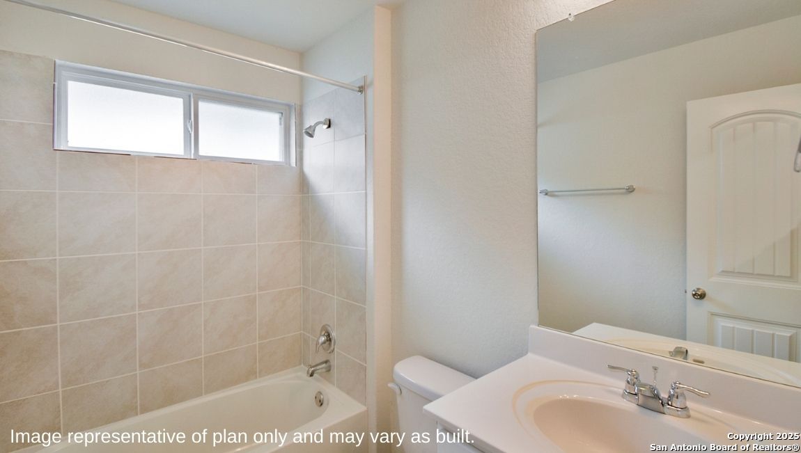 154 Double L Drive Comfort, TX 78620 - Photo 20 of 26 a bathroom with a shower and a sink