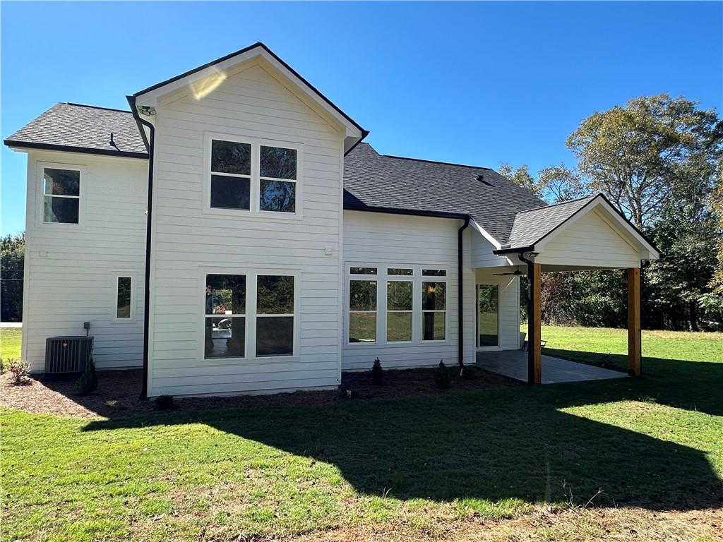 3354 Plainview Road Maysville, GA 30558 - Photo 12 of 50 a front view of a house with a yard