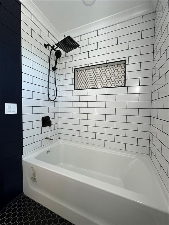 3354 Plainview Road Maysville, GA 30558 - Photo 17 of 50 a bathroom with a bathtub and shower