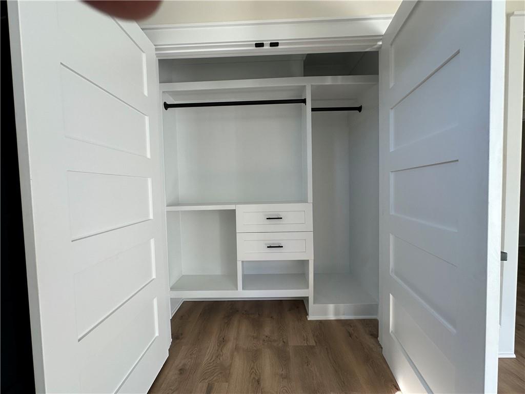 3354 Plainview Road Maysville, GA 30558 - Photo 18 of 50 a view of walk in closet with empty racks