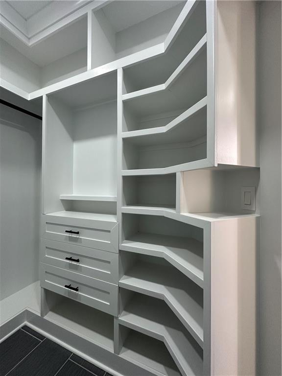 3354 Plainview Road Maysville, GA 30558 - Photo 26 of 50 a view of walk in closet with empty racks