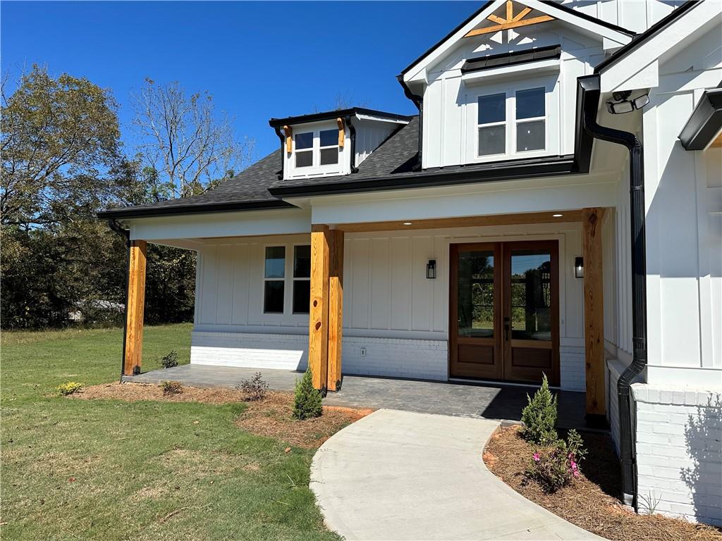 3354 Plainview Road Maysville, GA 30558 - Photo 41 of 50 a front view of a house with a porch