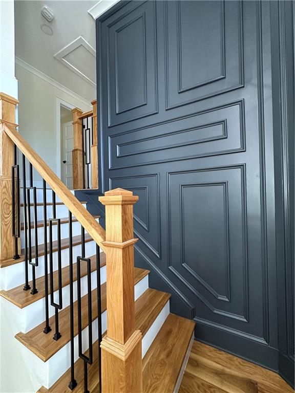 3354 Plainview Road Maysville, GA 30558 - Photo 5 of 50 a view of staircase with wooden floor and chair