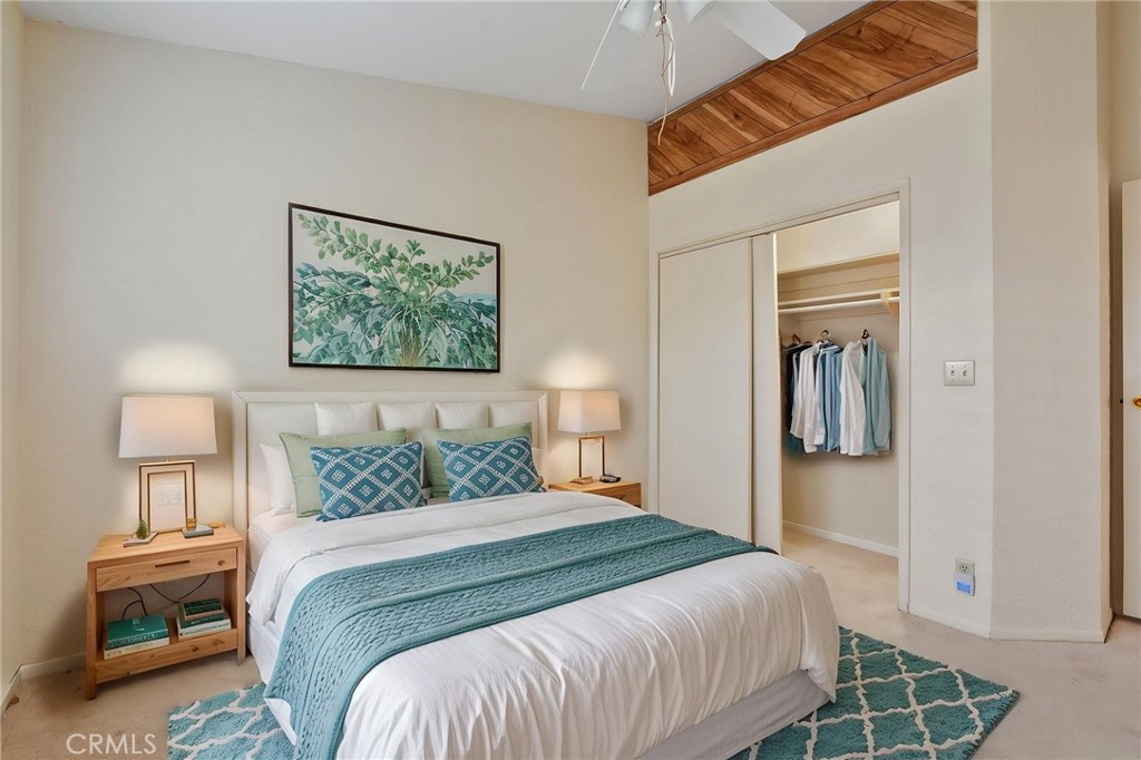 5385 Strasbourg Avenue Irvine, CA 92604 - Photo 13 of 59 a bedroom with a bed and a painting on the wall