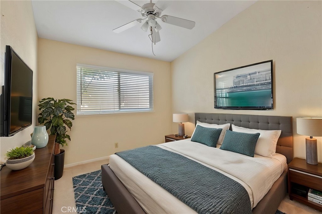 5385 Strasbourg Avenue Irvine, CA 92604 - Photo 15 of 59 a bedroom with a bed and a potted plant