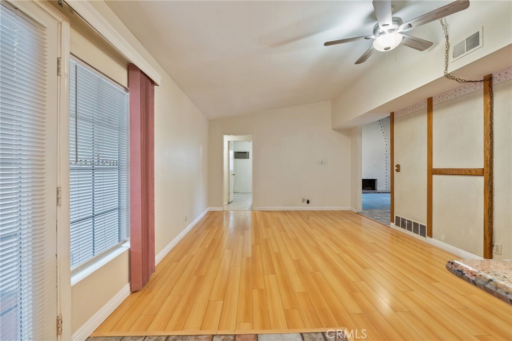 5385 Strasbourg Avenue Irvine, CA 92604 - Photo 16 of 59 a view of empty room with wooden floor and fan