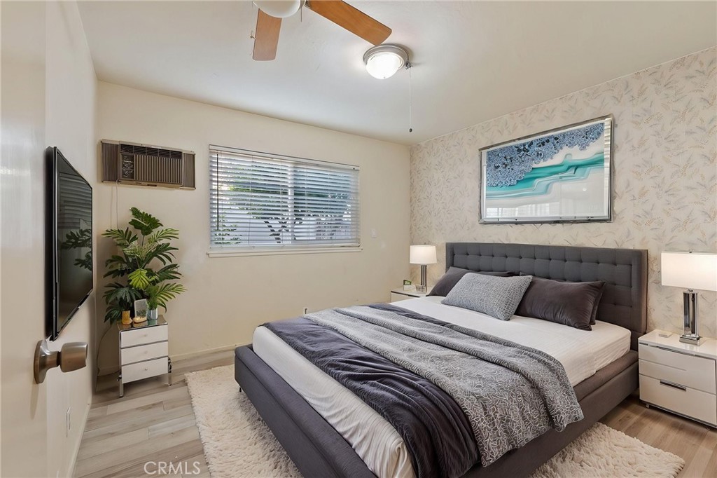 5385 Strasbourg Avenue Irvine, CA 92604 - Photo 24 of 59 a bedroom with bed and a potted plant