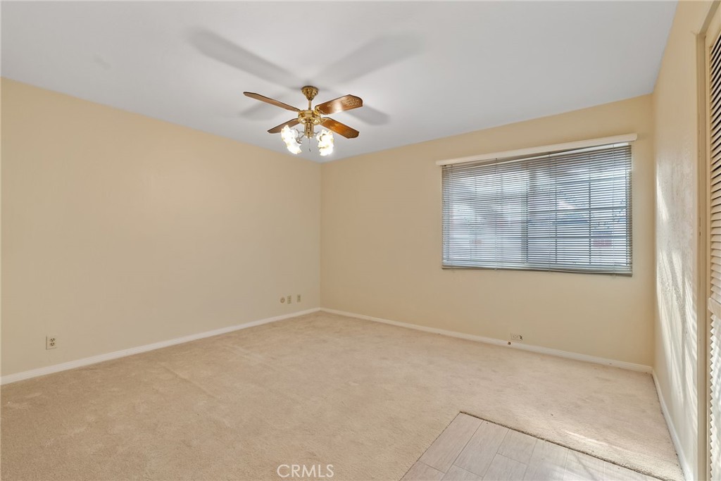 5385 Strasbourg Avenue Irvine, CA 92604 - Photo 29 of 59 an empty room with a window and a fan
