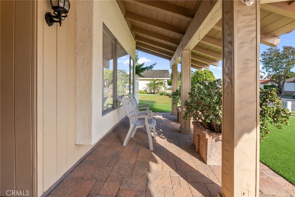 5385 Strasbourg Avenue Irvine, CA 92604 - Photo 3 of 59 a porch with a table and chairs in balcony